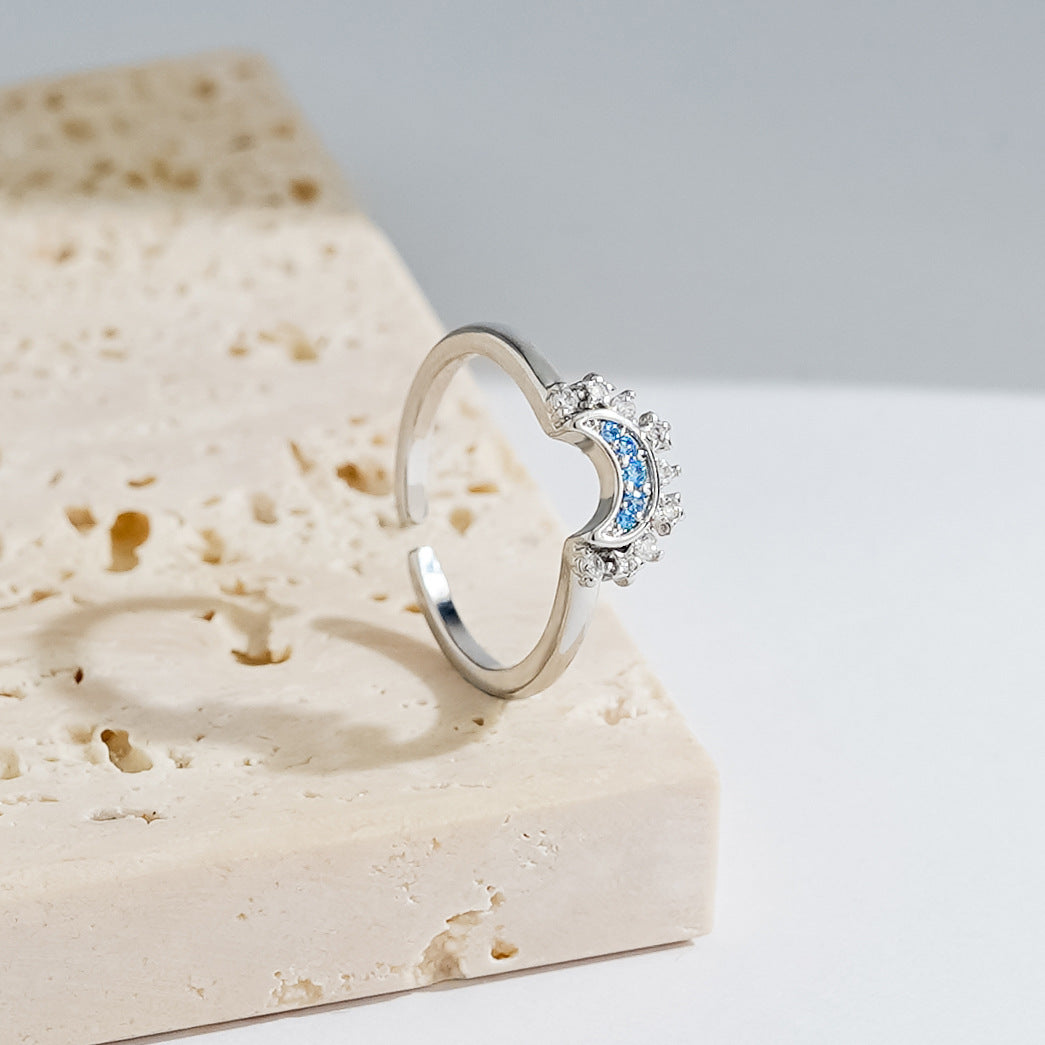 Ring with the sun and moon superimposed on it